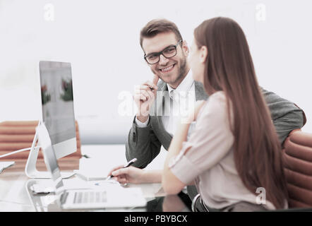 Two managers in a business meeting analyzing data Stock Photo