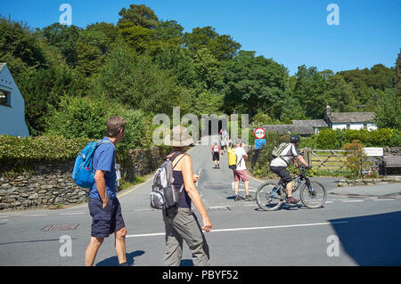 Tourists in Grasmere Village, Lake District, Cumbria, North West England, UK Stock Photo