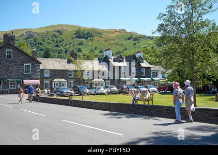 Tourists in Grasmere Village, Lake District, Cumbria, North West England, UK Stock Photo