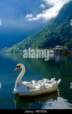 Swan Boats for hire on Hallstatter See, Hallstatt, Upper Austria, Austria, Europe Stock Photo