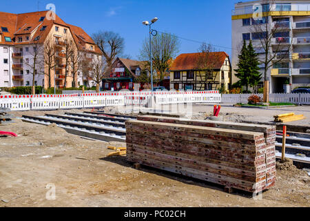 Strasbourg, tram construction site, railway tracks, safety plastic barriers, houses, line E extension, Alsace, France, Europe, Stock Photo