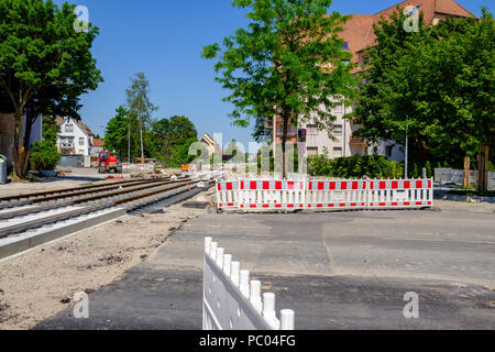 Strasbourg, tram construction site, railway tracks, concrete bed, safety plastic barriers, houses, line E extension, Alsace, France, Europe, Stock Photo