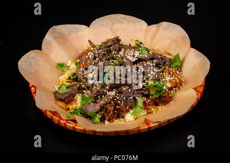 Asian cuisine - Fried glass noodle with beef Stock Photo
