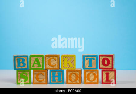 Back to School spelled out in wooden blocks Stock Photo