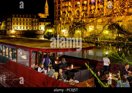 Café terrace on barge, bar on boat, people, night, Strasbourg, Alsace, France, Europe, Stock Photo