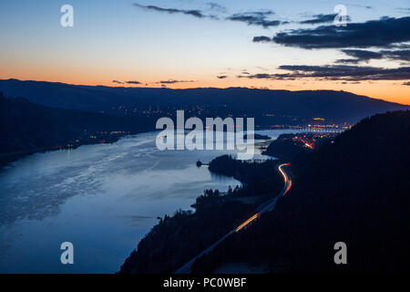 A long-exposire photograph of a sunrise near Hood River, Oregon, in the Columbia River Gorge. Stock Photo
