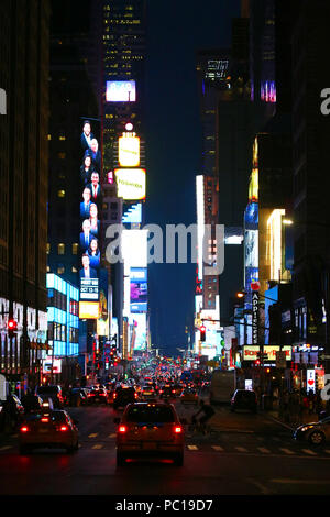 NEW YORK, NY - JULY 11: Broadway Theater District and Times Square neon lights seen south from 7th Avenue in Manhattan on evening JULY 11th, 2017 in N Stock Photo