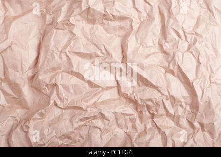 highly wrinkled craft paper background high detailed Closeup. Stock Photo