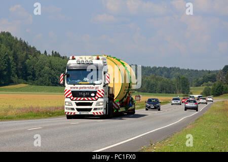 Wide load transport of a silo by MAN TGX 26.540 semi trailer of Peter-Star, Poland on the road in South of Finland. Salo, Finland - July 27, 2018. Stock Photo