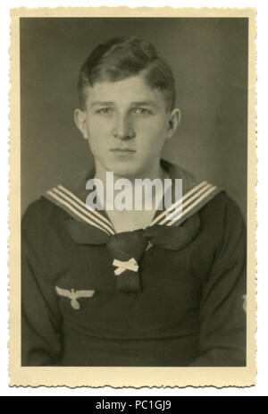 German historical photo: young handsome man, Navy sailor in military uniform, Kriegsmarines, Studio image, 1942, world war two, Germany, Third Reich Stock Photo