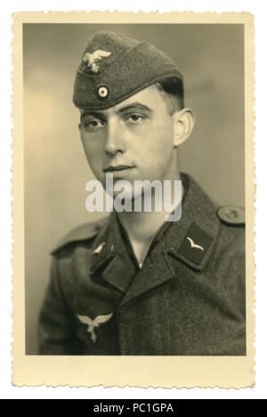 German historical photo: young handsome man, private air force in military uniform, Luftwaffe, Studio photography, world war two, Germany, Third Reich Stock Photo