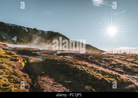 Boiling water and mud in the geothermal area Reykjadalur valley in South Iceland Stock Photo