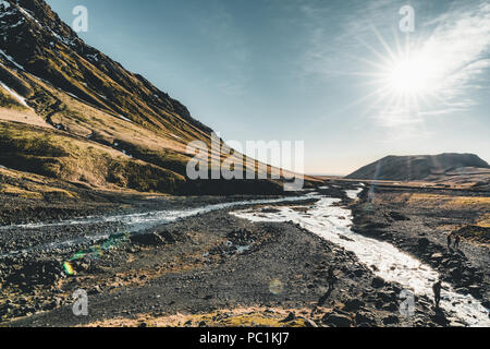 Iceland Fantastic views of the landscape with river and mountain with blue sky on a sunny day. Stock Photo