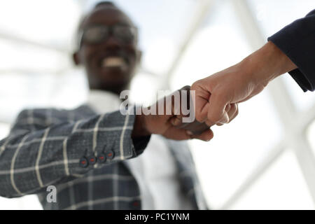 Business people showing Fist Bump after meeting Stock Photo