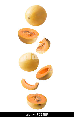 Isolated flying fruits. Falling melon isolated on white background with clipping path as package design element and advertising. Stock Photo