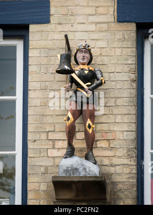Replica of the Southwold Jack, 15th century wooden figure, on the facade of the Adnams Brewery building, in the town of Southwold, Suffolk UK Stock Photo
