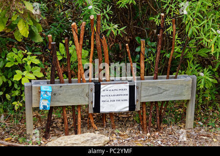 Walking sticks for sale on the Queen Charlotte track, New Zealand Stock Photo