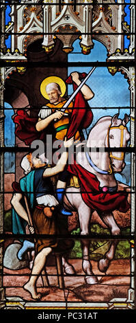 Saint Martin, stained glass window in Saint Severin church in Paris, France Stock Photo