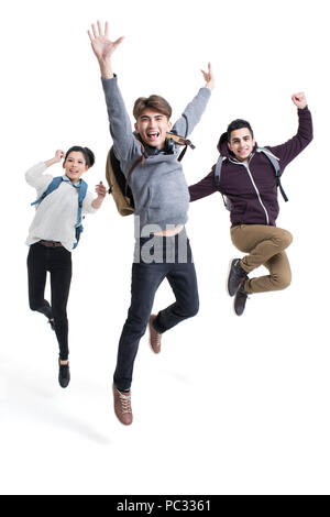 Cheerful abroad students jumping Stock Photo