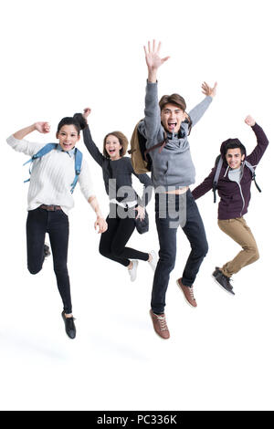 Cheerful abroad students jumping Stock Photo