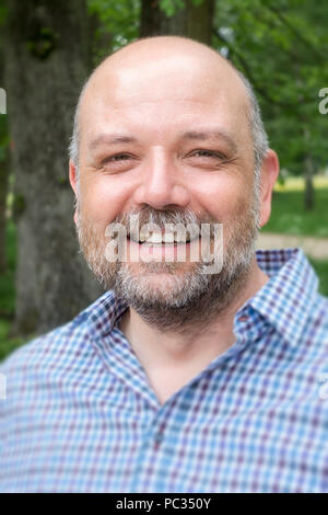 An image of a handsome bearded man portrait outdoors Stock Photo