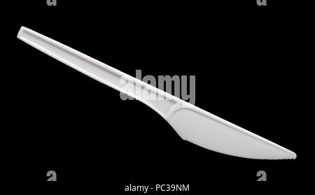 Plastic knife isolated on black background Stock Photo