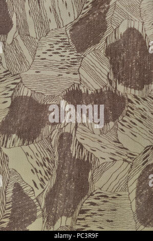 Custom camouflage texture pattern vertical pale green tan taupe brown textured camo background old aged weathered cotton twill fabric field work parka Stock Photo