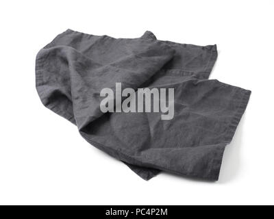Side view on dark black linen napkin isolated on white background. Anthracite grey linen napkin. Isolated on white with clipping path. Stock Photo