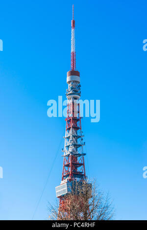 Asia Business concept for real estate and corporate construction - close up view of Tokyo Tower with bright blue sky Stock Photo