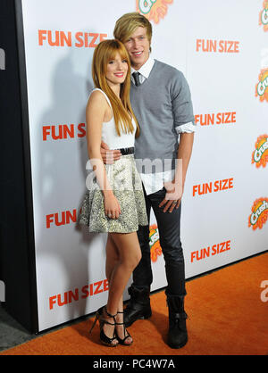 Bella Thorne, Tristan Klier  at the Fun Size Premiere at the Paramount studio Theatre in Los Angeles.Bella Thorne, Tristan Klier  ------------- Red Carpet Event, Vertical, USA, Film Industry, Celebrities,  Photography, Bestof, Arts Culture and Entertainment, Topix Celebrities fashion /  Vertical, Best of, Event in Hollywood Life - California,  Red Carpet and backstage, USA, Film Industry, Celebrities,  movie celebrities, TV celebrities, Music celebrities, Photography, Bestof, Arts Culture and Entertainment,  Topix, vertical,  family from from the year , 2012, inquiry tsuni@Gamma-USA.com Husban Stock Photo