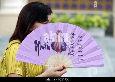 Church of the Sacred Heart of Jesus ( Nha Tho Tan Dinh ).   Merciful  Jesus, I trust in you fan.  Ho Chi Minh City. Vietnam. | usage worldwide Stock Photo