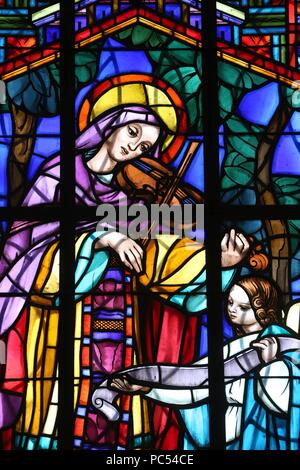 Dalat cathedral.  Stained glass window. Saint Cecilia  is the patroness of musicians. Dalat. Vietnam. | usage worldwide Stock Photo