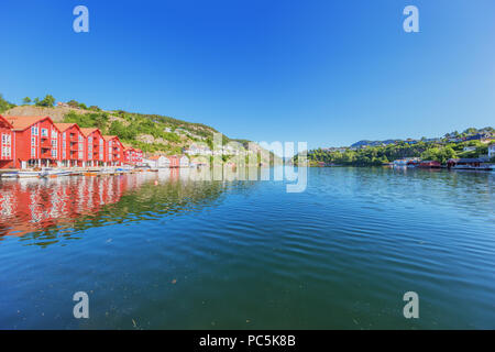 The waterfront of Flekkefjord fringed with vacation houses Stock Photo