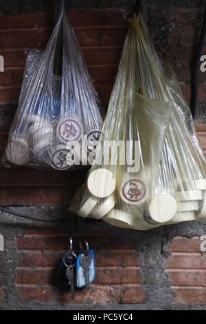 Chinese chess pieces in plastic bag. Kon Tum. Vietnam. | usage worldwide Stock Photo
