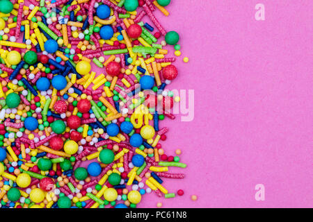 Colourful candy cake decorative sprinkles background Stock Photo