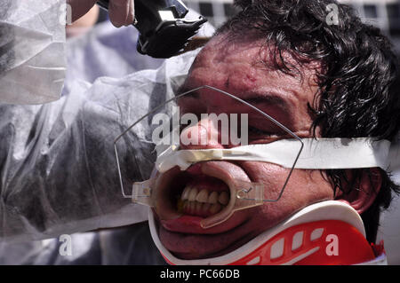 Sao Paulo, Brazil. 31st Juky 2018. PROTEST AGAINST ANIMAL TESTS: Activist of the NGO Veddas (Ethical Vegetarianism, Defense of the Animal Rights and Society) protest against the animal tests. Activist passes tests against animals, ingests fabric softener among other tortures. The act happened on Avenida Paulista in SÃ£o Paulo. Credit: Cris Faga/ZUMA Wire/Alamy Live News Stock Photo