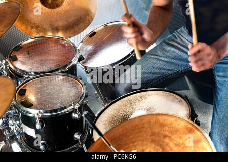 Drummer playing the drumset.Music and entertainment concept.Percussion sound recording in studio.Music band and musician on stage Stock Photo