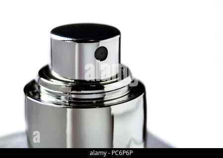 Top of perfume spray bottle isolated macro on white background Stock Photo