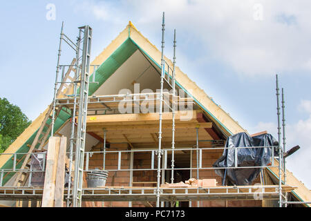 Gabled roof of new house as construction site with air Stock Photo