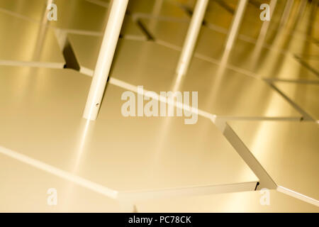 Abstract industrial zigzag pattern sharpness gradient with beams of light and warm colors backdrop Stock Photo