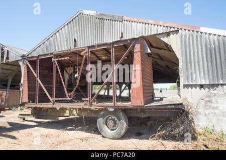 abandoned railway carriage on a farm Stock Photo