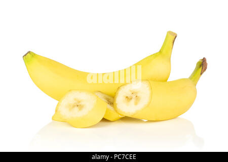 Group of one whole one half three slices of fresh yellow banana isolated on white background Stock Photo