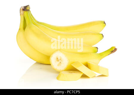 Group of lot of whole one half three slices of fresh yellow banana isolated on white background Stock Photo