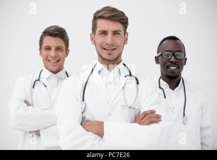 three confident doctors colleagues standing together Stock Photo