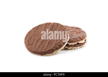 Chocolate topped rice cakes on isolated white background Stock Photo