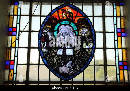 Stained glass windows at the Church of Saint Finbarr and All Angels in Inchigeelagh Stock Photo