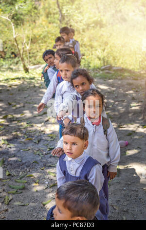 Village Elementary School Kids Forming Line For Morning Prayer 