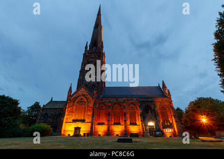 Late evening, floodlit picture of St Elphin's Parish Church, Church Street, Warrington, Cheshire, England, UK Stock Photo