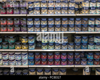 Stacks of household paint in DIY / homecare store. Stock Photo