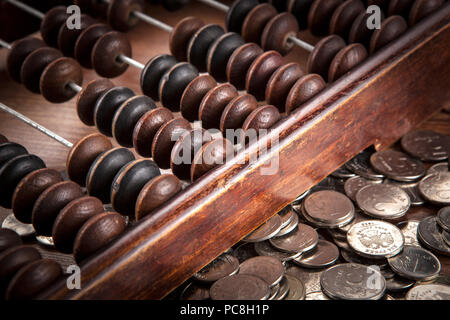 old abacus with russian ruble coins close up Stock Photo